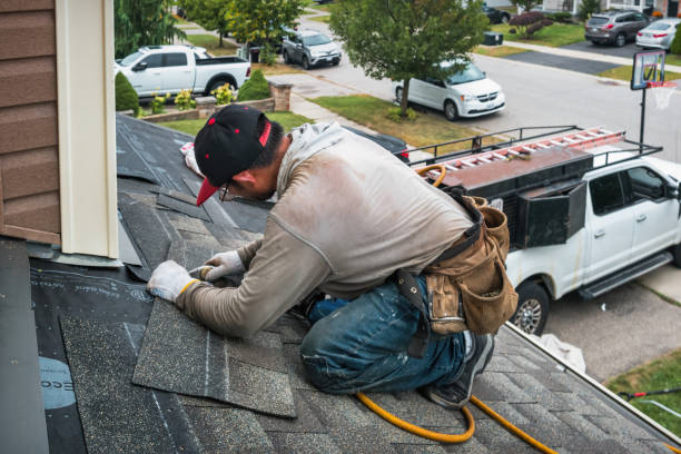 Professional Roofing technician working in Ottsville, PA